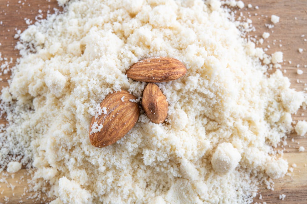 almonds over almond flour, studio shot