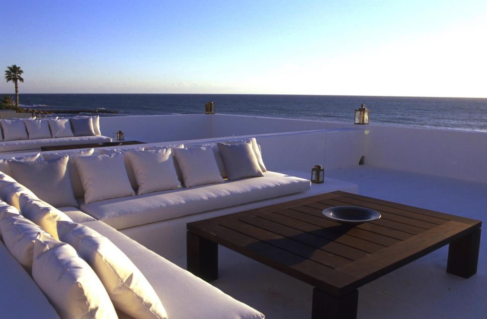 Sky, Property, Yacht, Luxury yacht, Deck, Boat, Room, Ocean, Furniture, Roof, 