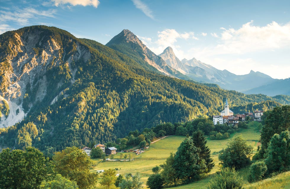 alpe di siusi sunrise with sassolungo or langkofel mountain group in background