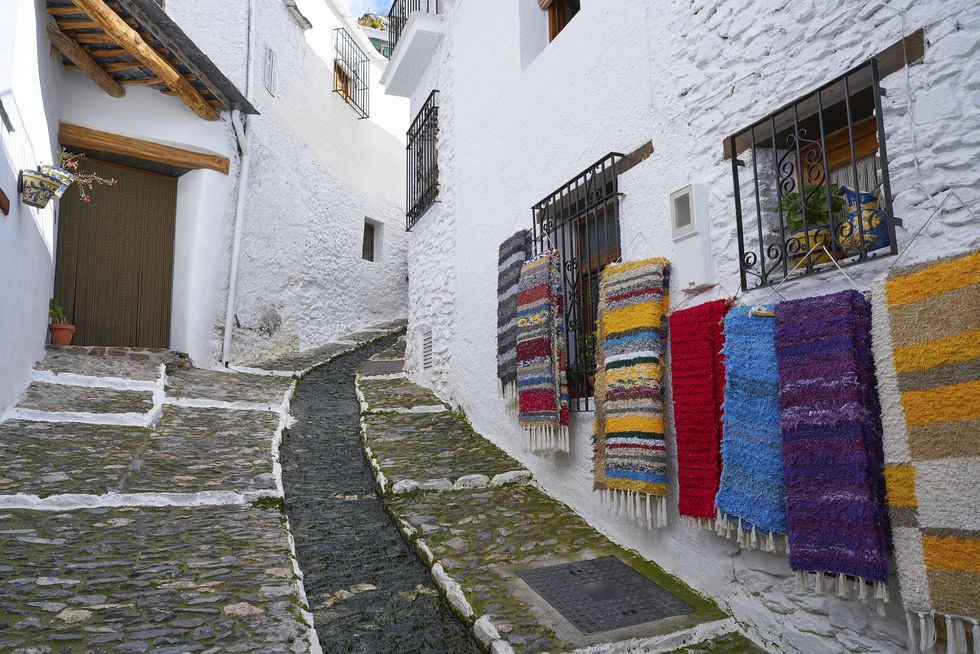 alpujarras street rugs in pampaneira of granada colorful serape