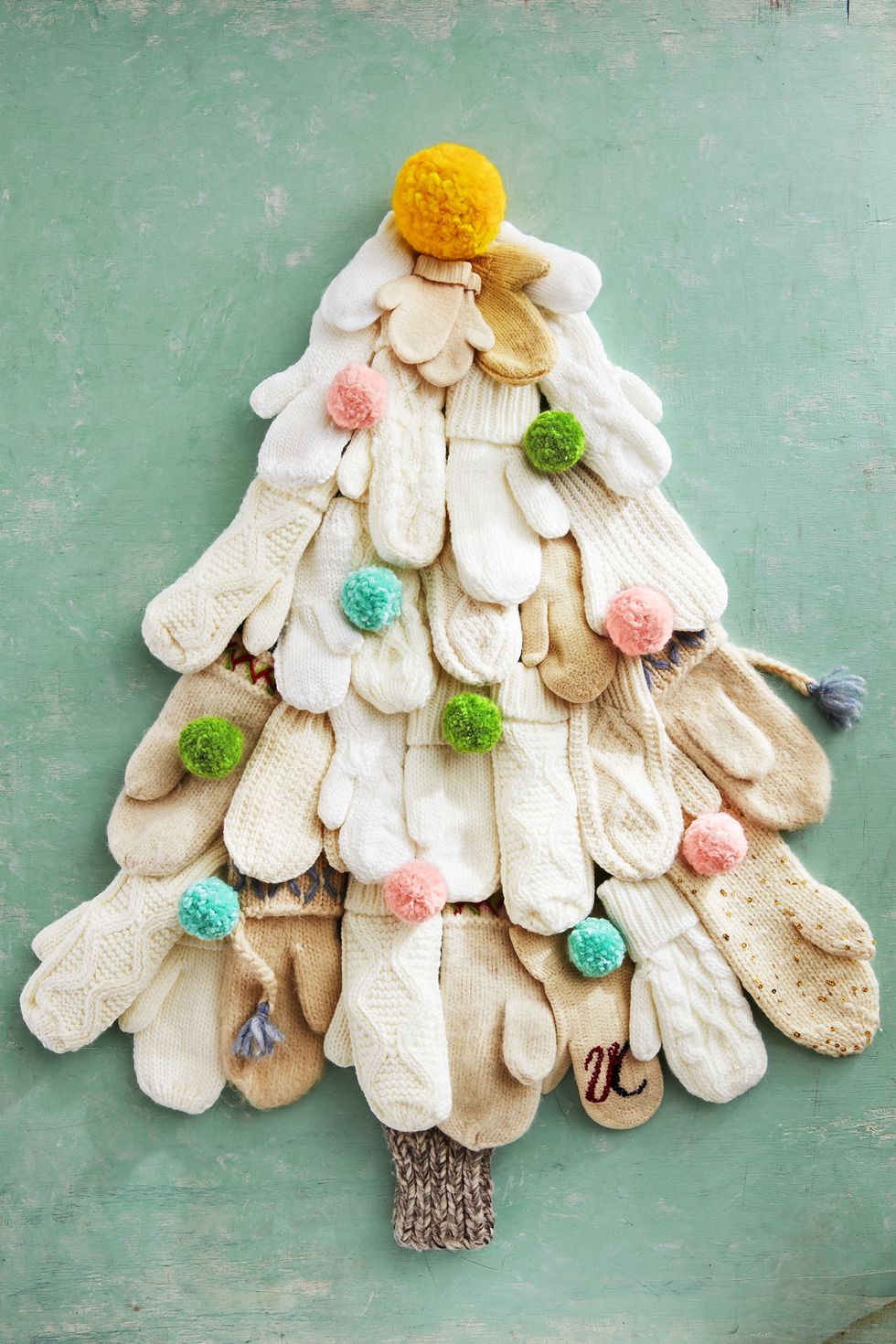 wool mittens hung like a christmas tree