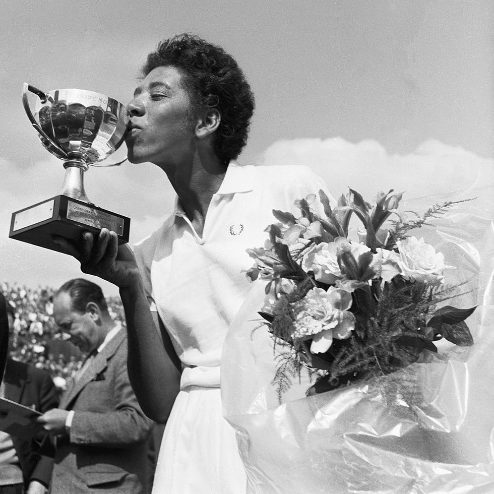 althea gibson kissing trophy cup