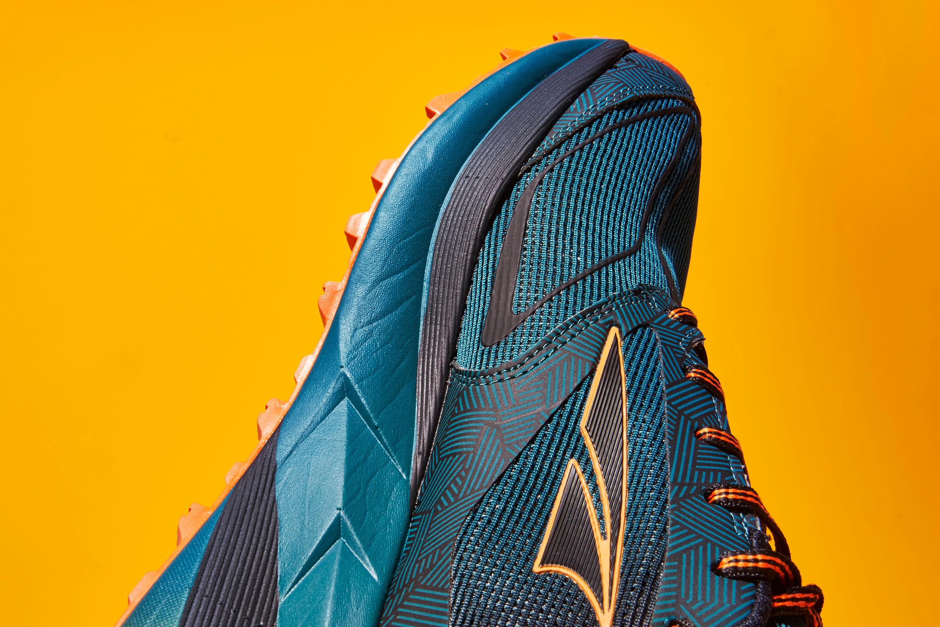 Blue, Yellow, Footwear, Skyscraper, Architecture, Orange, Shoe, Electric blue, Sky, Building, 