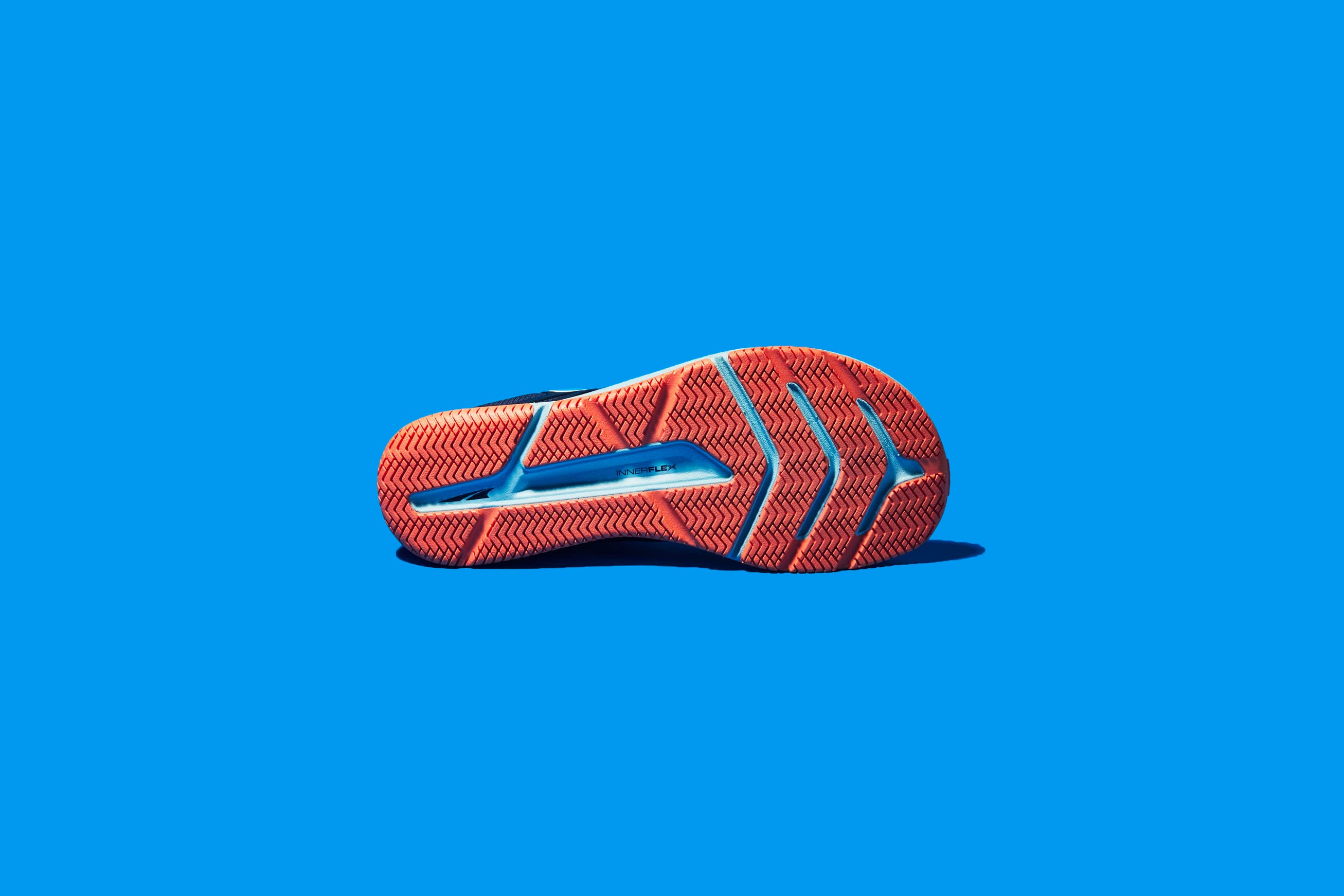 Footwear, Orange, Shoe, Red, Azure, Electric blue, Font, Outdoor shoe, Athletic shoe, Logo, 
