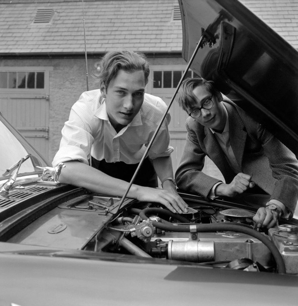 prince william of gloucester left and younger brother prince richard look under the bonnet of his car in the grounds of the family home near peterborough   photo by pa images via getty images