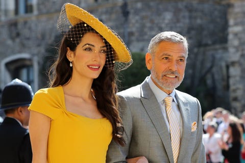 Amal Clooney and George Clooney arrive at St George's Chapel at Windsor Castle before the wedding of Prince Harry to Meghan Markle on May 19, 2018 in Windsor, England. Amal Clooney and George Clooney arrive at St George's Chapel at Windsor Castle before the wedding of Prince Harry to Meghan Markle on May 19, 2018 in Windsor, England.