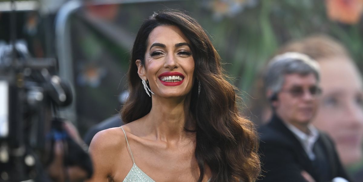 Amal Clooney wears a silver sequin dress in Sicily