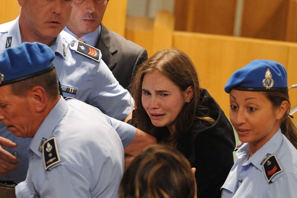 amanda knox and raffaele sollecito win their appeal against their conviction for the murder of meredith kercher