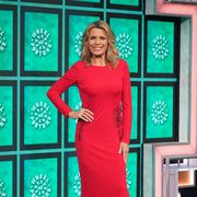 vanna white wearing red gown on abc's "celebrity wheel of fortune"