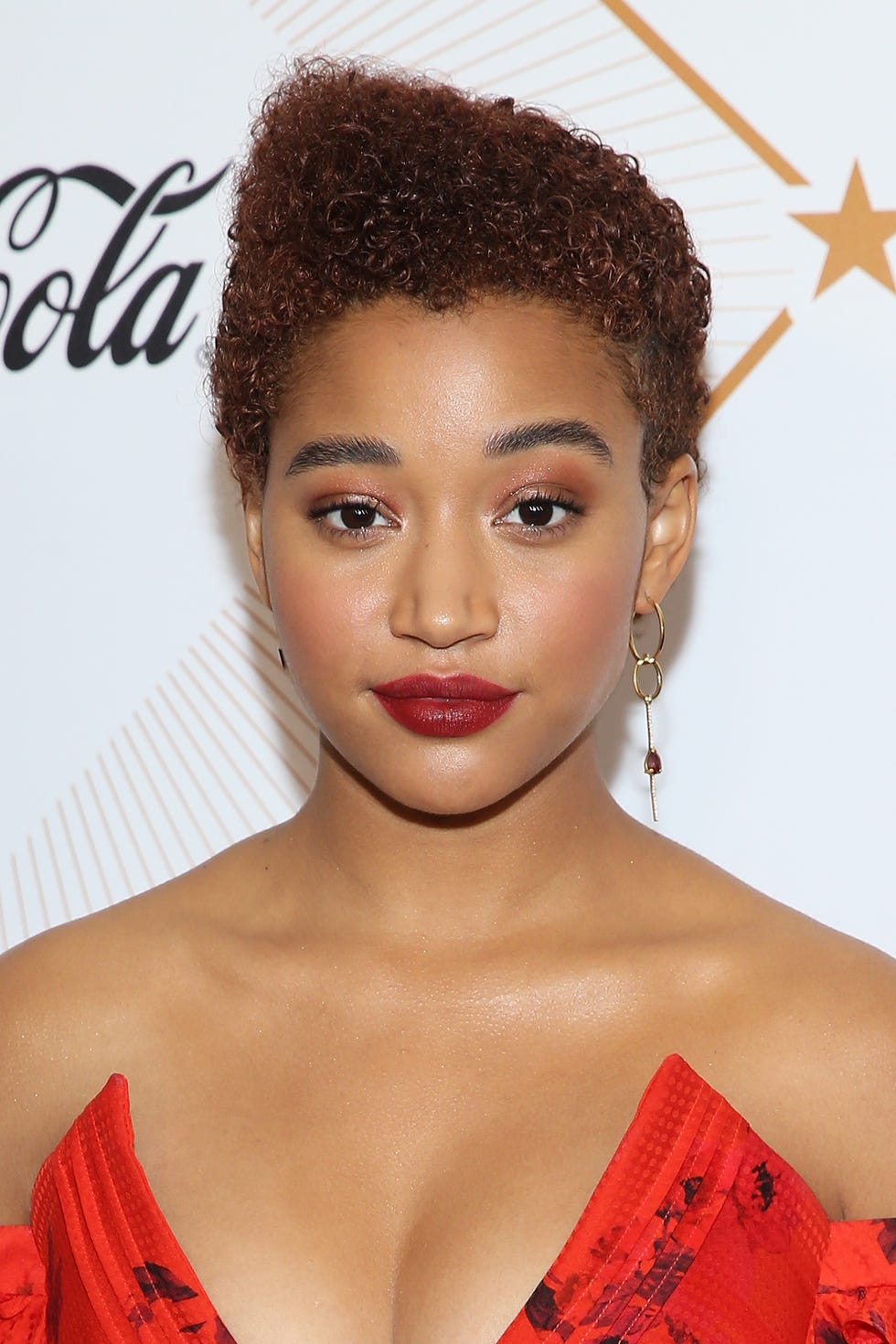 amanda stenberg's asymmetrical fro looks dazzling with a plunging neckline shot black hairstyle ideas