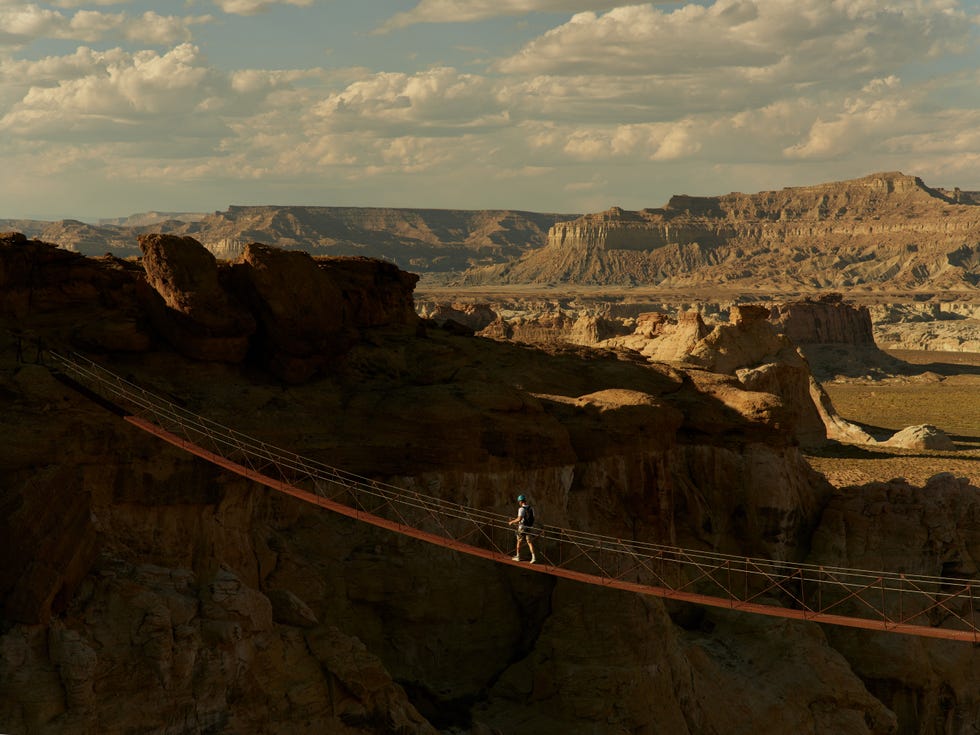 a suspension bridge over a gorge
