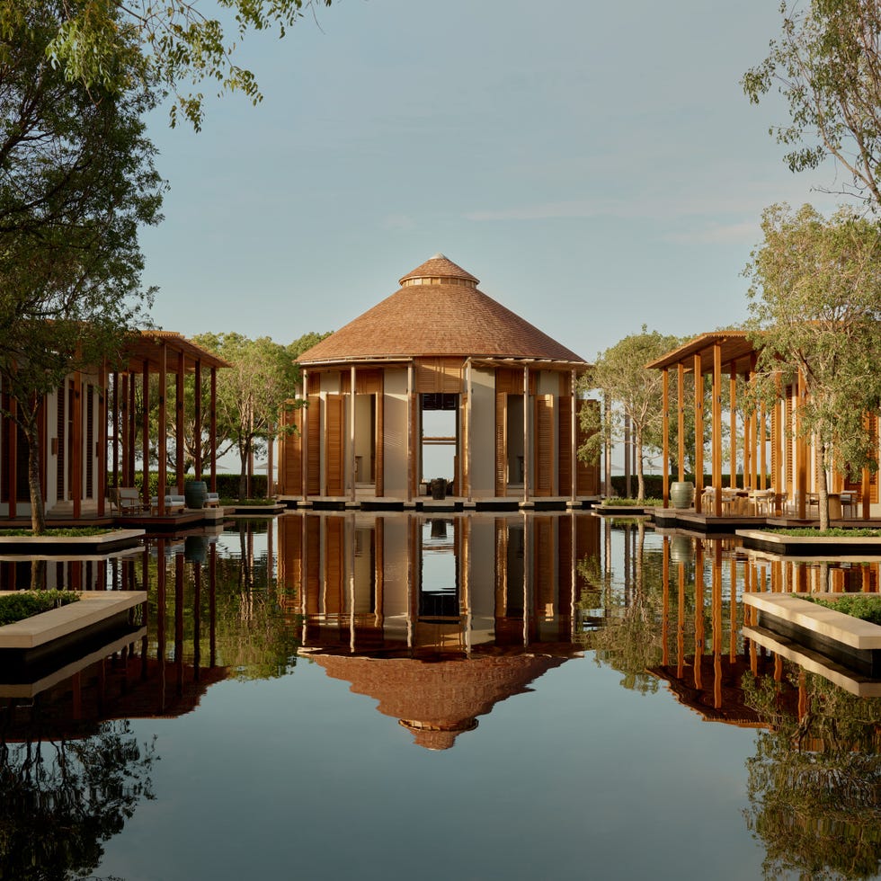 serene architecture surrounded by water and greenery