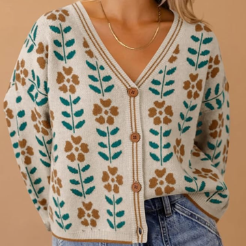Amazon Women's Fall Fashion 2024 - The Cutest Fall Cardigan a woman wearing a cream colored button up cardigan with orange and green floral print on it