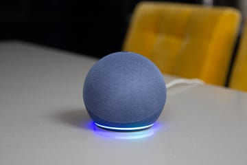 a blue ball on a white surface