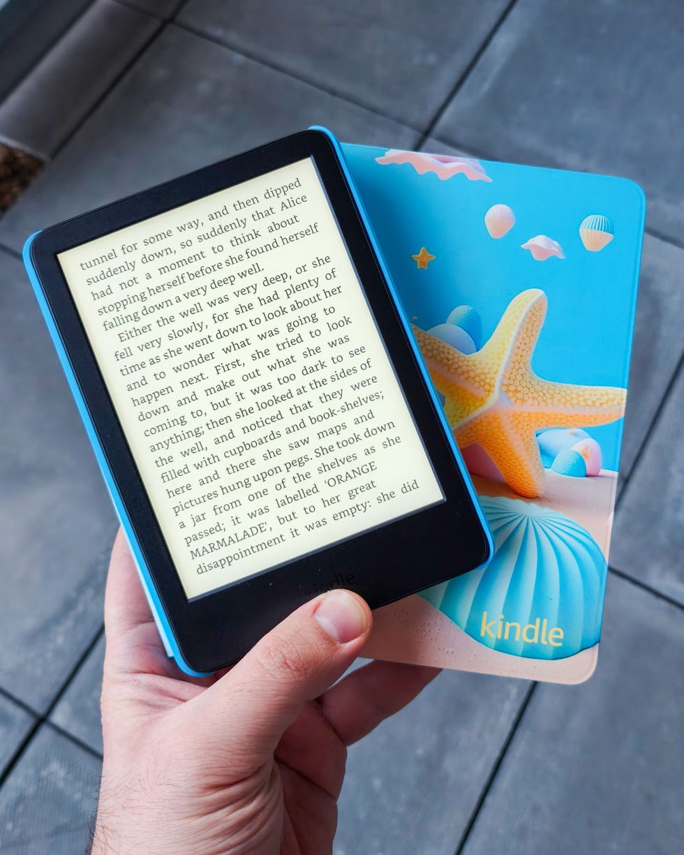 an amazon kids ereader displaying text with a another kids ereader in a colourful protective cover featuring a starfish