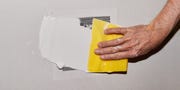 repairing a wall with a kit
