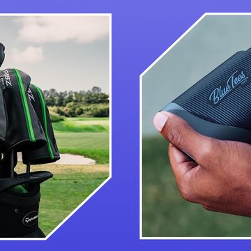 golf clubs in bag on course, hands holding rangefinder