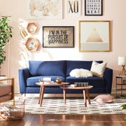 Living room, Furniture, Room, Couch, Interior design, Wall, Coffee table, Table, Yellow, studio couch, 