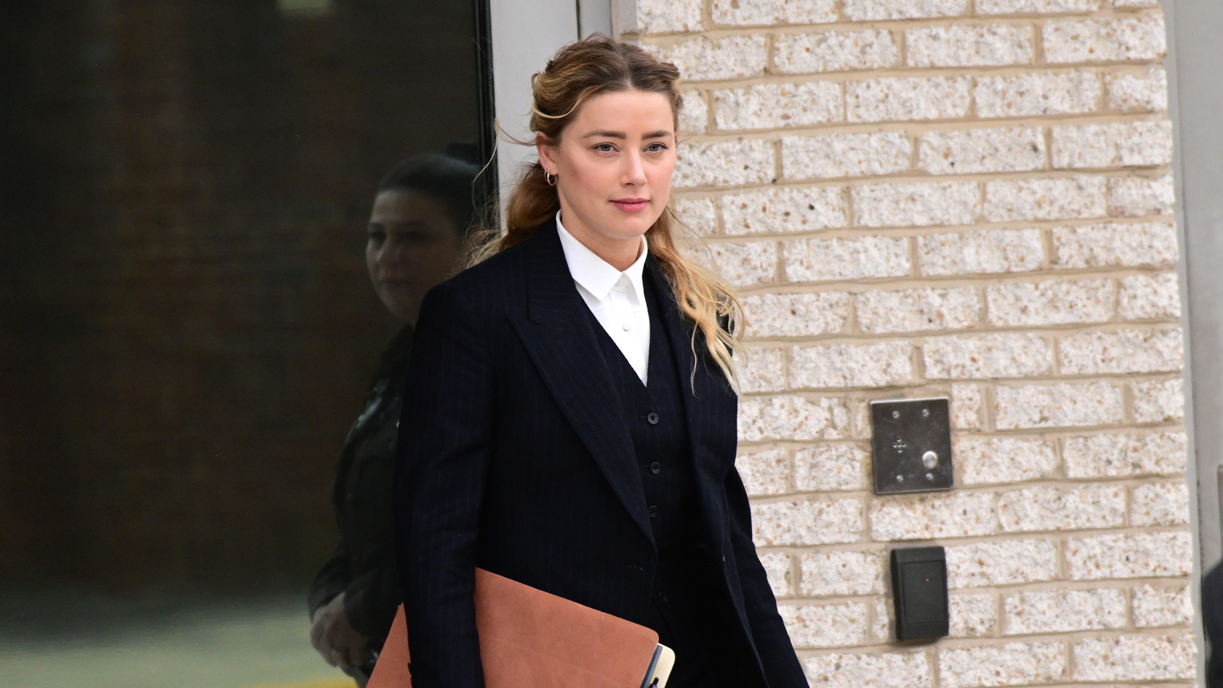 [Image: amber-heard-departs-following-the-recess...center,top]