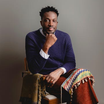 amechi mandi with his treasured object