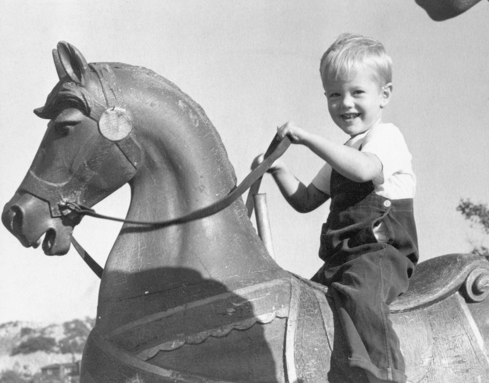Young Peter Fonda on Rocking Horse