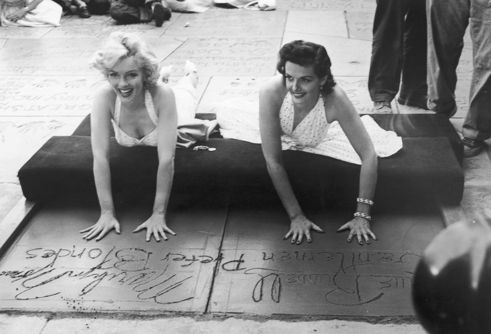 Monroe And Russell Leave Handprints At Grauman's Chinese Theater, CA, 1953.