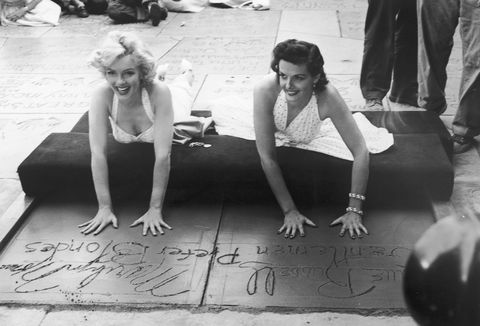 Monroe And Russell Leave Handprints At Grauman's Chinese Theater, CA, 1953.