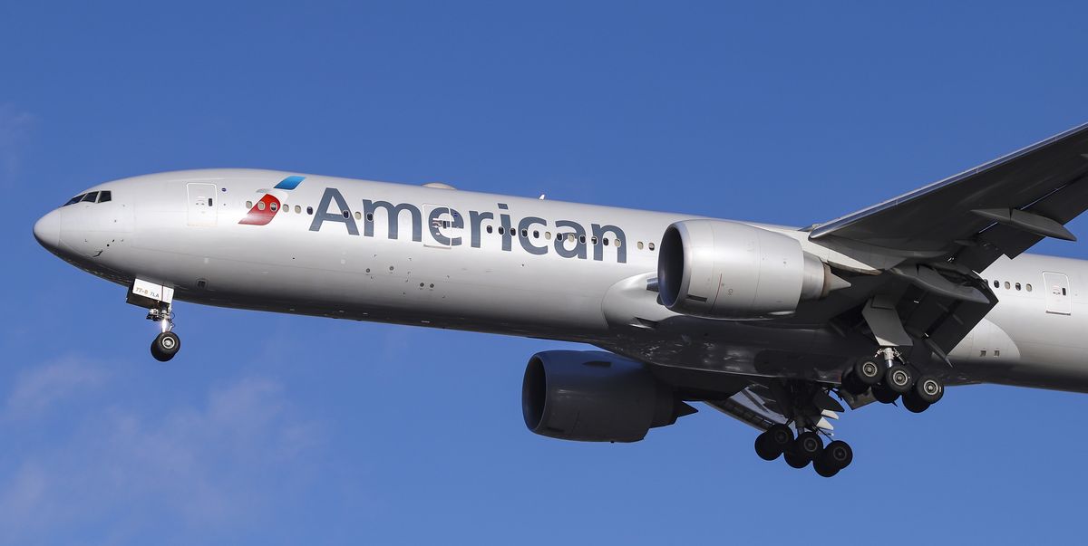 American Airlines Boeing 777-300 with registration N717AN is...