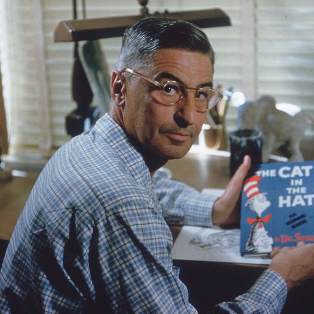 dr seuss holds 'the cat in the hat'
