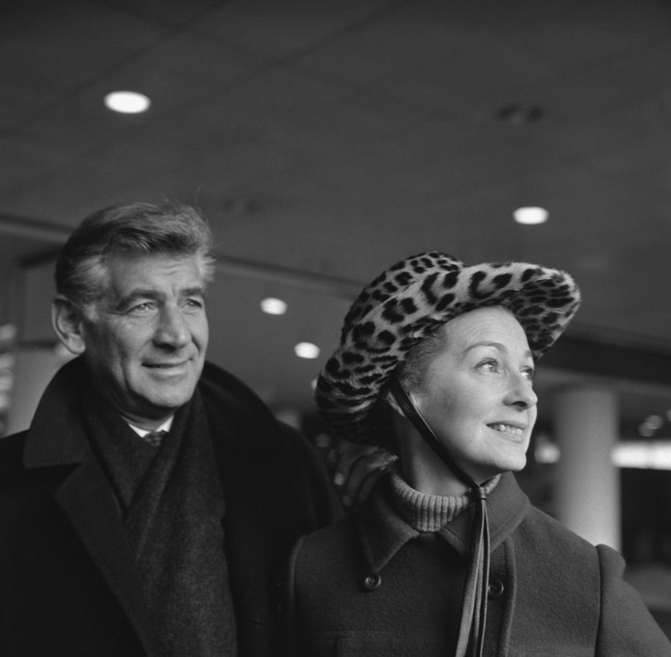 leonard bernstein and felicia montealegre stand together in 1966