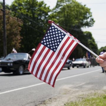 american flag at memorial day parade