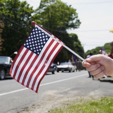 american flag at memorial day parade