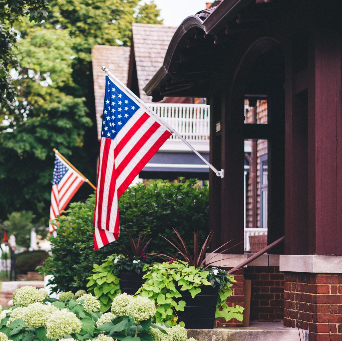 american flags on houses