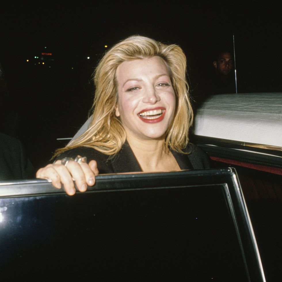 american singer and songwriter taylor dayne, smiling as she stands behind the open door of a car in los angeles, california, circa 1990. (photo by vinnie zuffante/getty images)