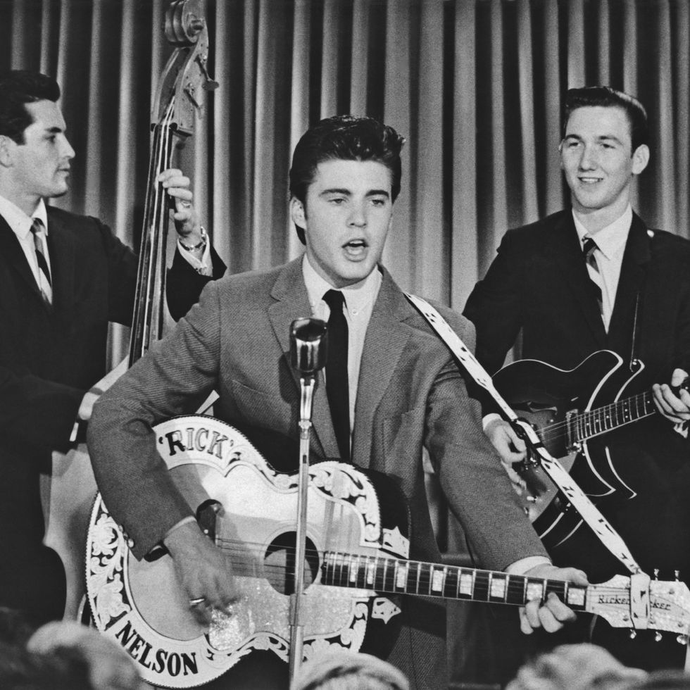 american singer, musician and actor ricky nelson (1940 1985) performing on stage with bassist james kirkland and guitarist james burton circa 1958. (photo by archive photos/getty images)