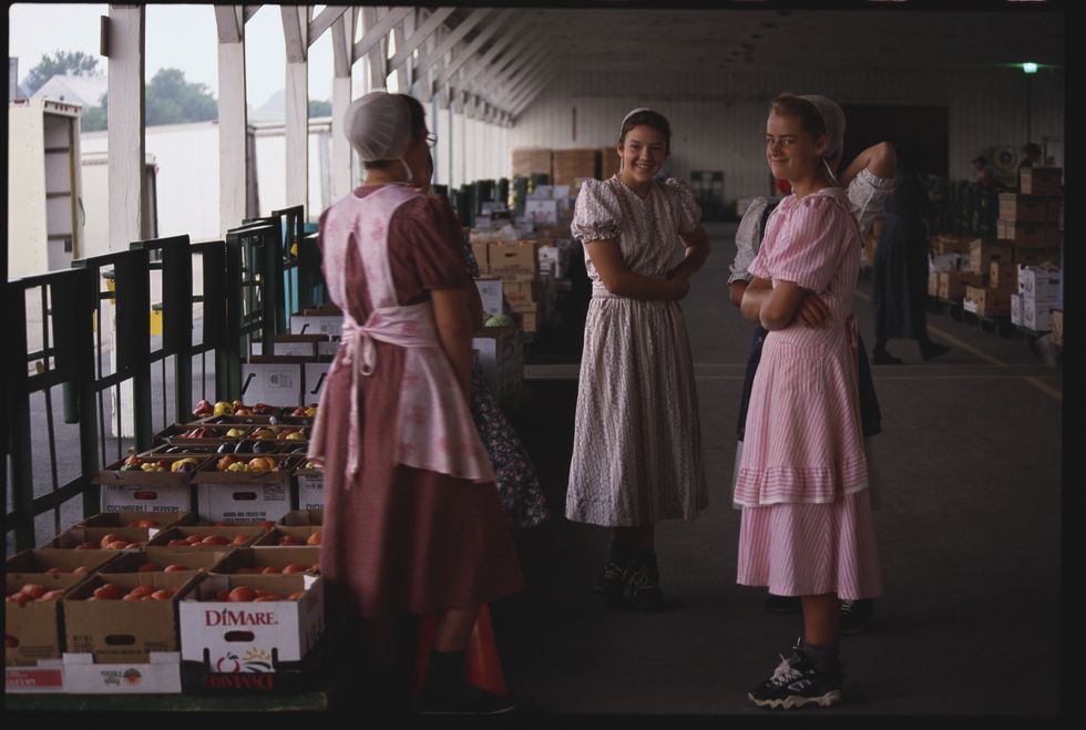 amish women in produce warehouse