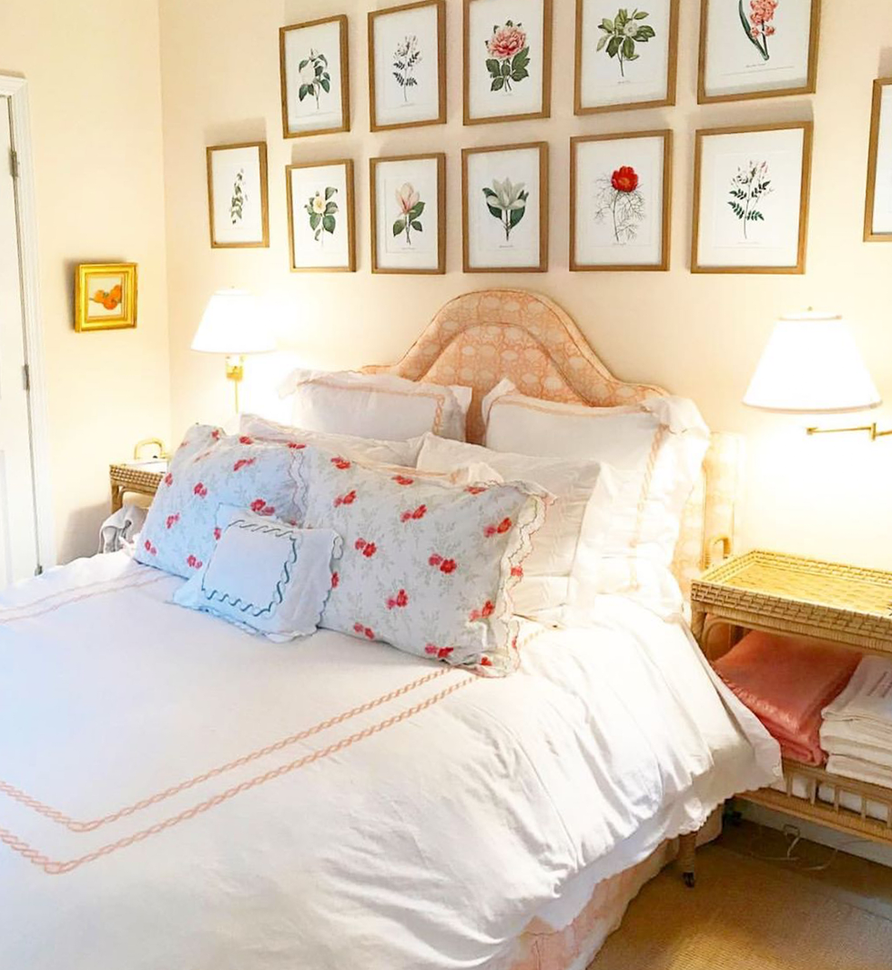 an antique print wall from etsy is the best bedroom art hack