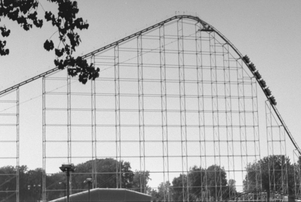 semi distant photo of cars full of riders starting the 206 foot, 70 mph drop on world's largest roller coaster, the magnum xl 200 designed by ron toomer, shot from the side, at the cedar point amusement park  photo by taro yamasakithe life images collection via getty imagesgetty images