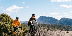 amy colyar and matt phillips on gravel with gravel bikes in colorado