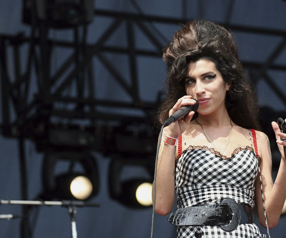chicago august 05 singer amy winehouse performs onstage at lollapalooza in grant park on august 5, 2007 in chicago, illinois photo by roger kisbygetty images