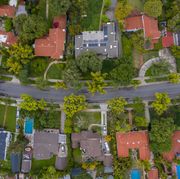 overhead shot of houses on a curved street