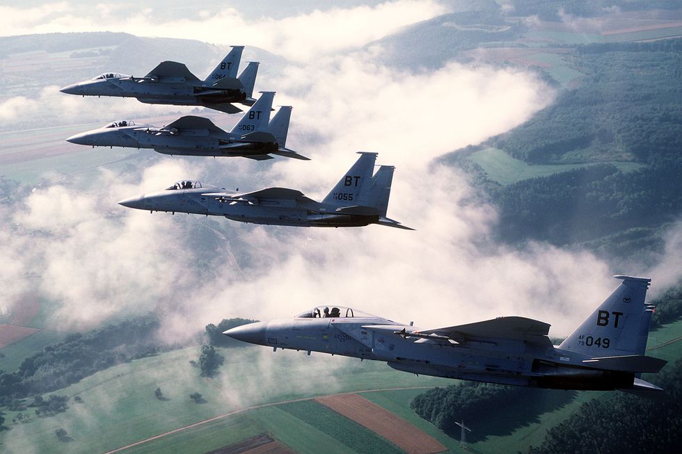 f 15c eagle aircraft armed with aim 9 sidewinder missiles
