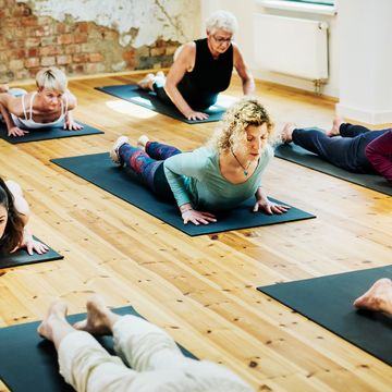 An Amateur Yoga Group Mid Pose