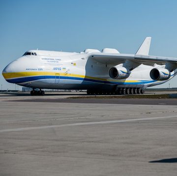 the an 225 mriya cargo plane sits on an airport tarmac