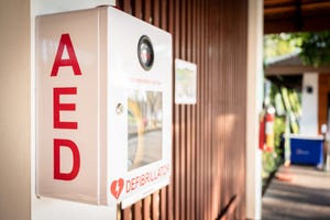 an automated external defibrillator, aed placed on the wall in public locations