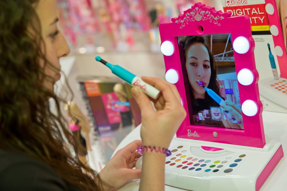 woman trying on barbie makeup