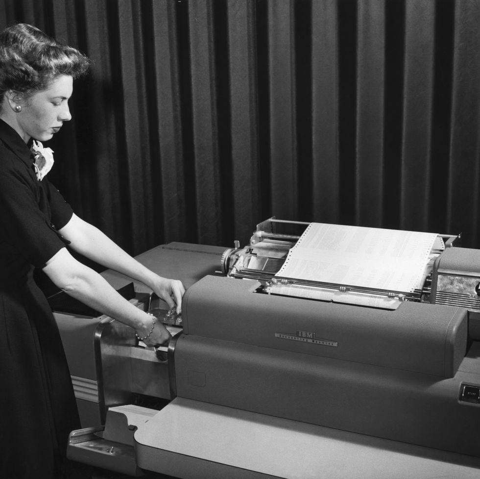 Loading Paper Into Typewriter by Bettmann