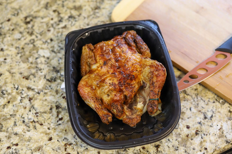 an organic rotisserie chicken on a  kitchen counter
