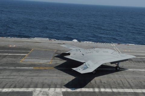 an x 47b unmanned combat air system makes an arrested landing