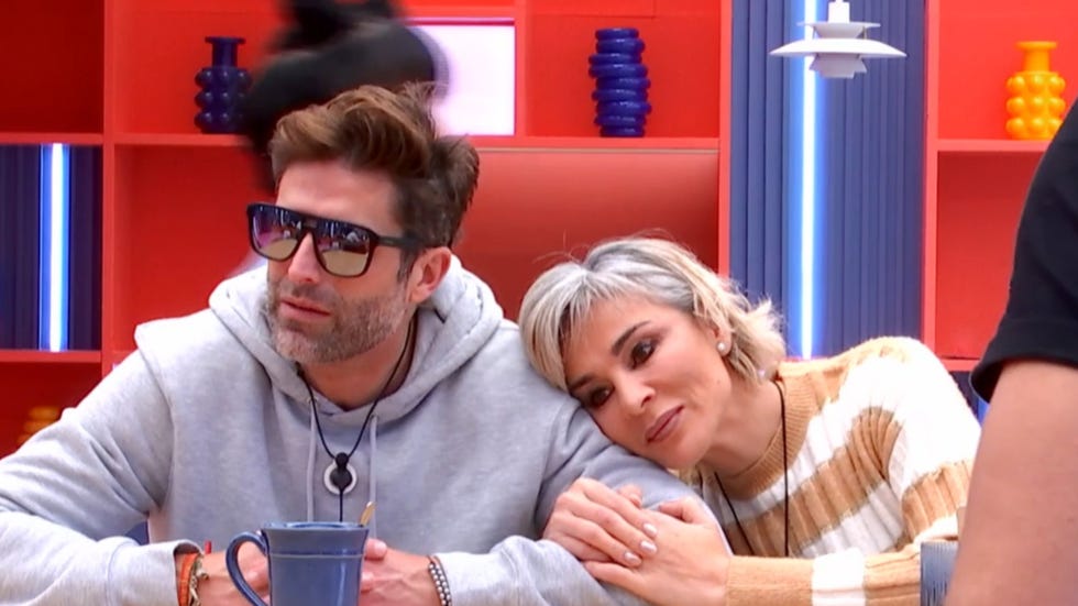 a man and woman sitting together